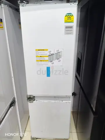 White built-in refrigerator unit - good condition