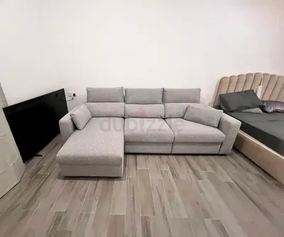 Eskilstuna L shape sofa bed with storage