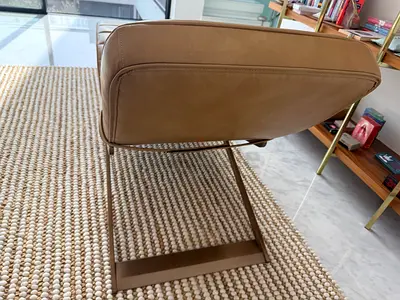 Modern tan leather chair with