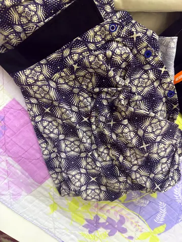 Used patterned mans /top - size unknown, good condition