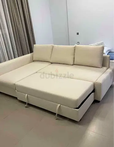 Comfortable Cream L-Shaped Sofa Bed with Pull-Out Extension