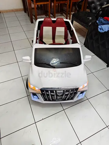 Kids electric ride-on car SUV with lights — white, 2-seater