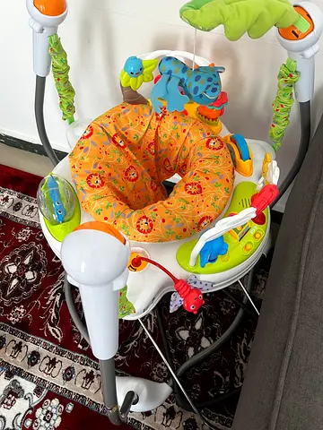 Baby Jumper/Activity Exercizer with Toys -Excellent Condition