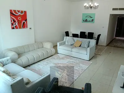 This two-bedroom apartment offers a spacious 1816 sq ft living room and includes a maid's room. It'