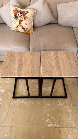 Pair of modern wooden nesting side tables with metal legs
