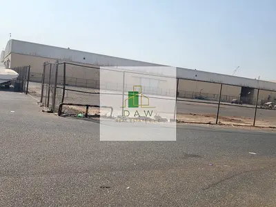 60,000 SQFT OPEN PLOY FOR RENT WITH BOUNDRY WALL IN UMQ