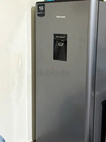 Hisense single-door refrigerator with water dispenser - good condition