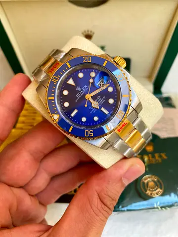 The Rolex Submariner Date "Bluesy" (Ref. LB) is a luxury two-tone dive watch combining Oystersteel a