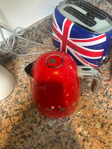 Smeg Red electric kettle (used) with Union Jack toaster visible