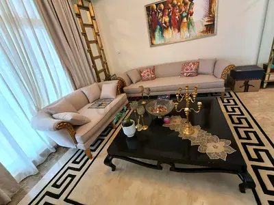 Elegant Sofa Set with Classic Gold Detailing
