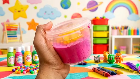 Handheld Tub of Pink Kinetic Sand / Play Dough