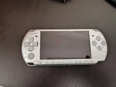 Sony PSP handheld console - White, working condition. Includes case and 8GB memory card.