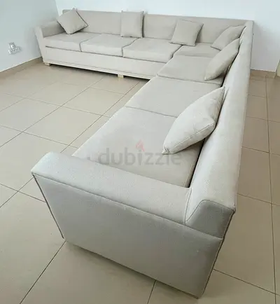 Large Beige Corner Sectional Sofa with Cushions