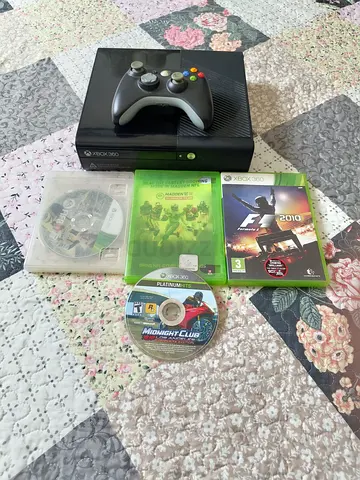 Xbox 360 with 4 cd's and well maintained