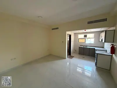 Spacious studio apartment in Al Nuaimiya 3 with a semi-separate kitchen, at a special price opposite the Sharjah exit.