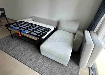 Light Grey L-Shaped Sofa Bed with Pull Out Mattress