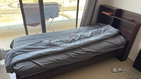 Single wooden bed frame with headboard storage - excellent condition