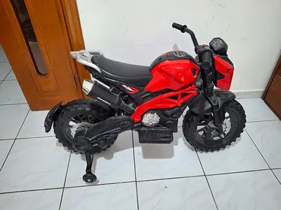 Red Electric Ride-on Toy Motorcycle for Kids - Good Condition