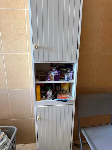Tall white storage cabinet with shelves - good condition