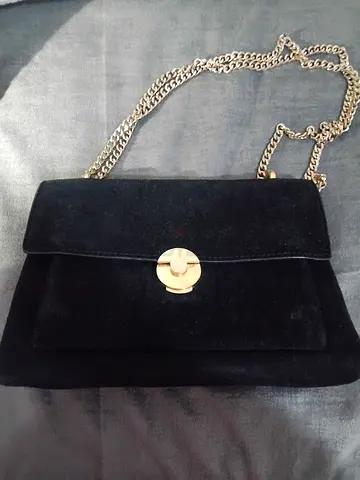 Black suede shoulder bag with gold chain strap (pre-owned one time used)