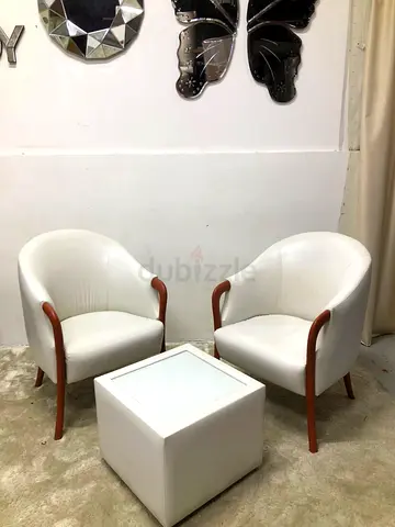 White Leather Armchair’s with coffee table