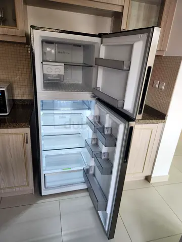 Double-door fridge/freezer in good condition - 2-door refrigerator - bought in Feb