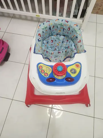 Baby Walker with Music and Padded Seat - Good Condition