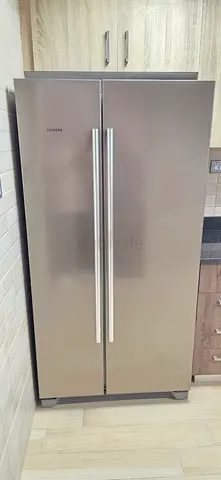 Siemens side by side refrigerators like new condition perfect working