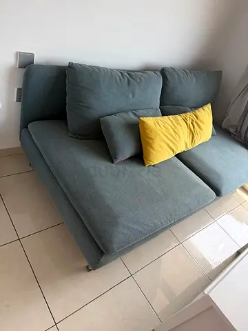 Comfortable Two-Seater Fabric Sofa in Light Blue - Good Condition