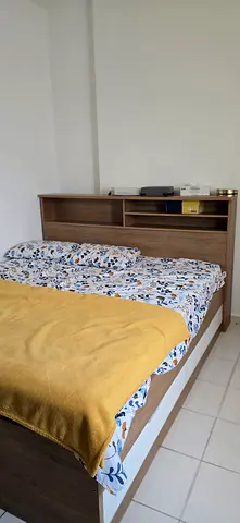 King size matress and bed with under storage  from home center in good condition for sale