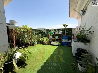 In the Al Yasmin area of Ajman, a corner villa with two floors and a rooftop terrace is available