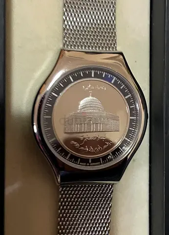 Men's silver mesh bracelet watch with engraved dome design
