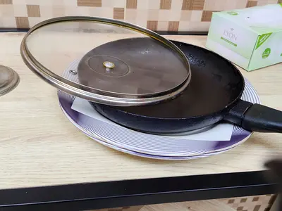 Used non-stick frying pan with glass lid