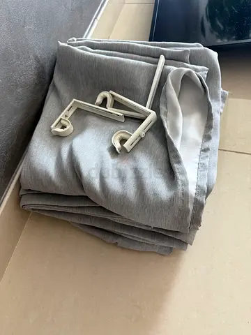 Light grey fabric curtains with hooks, used - ready to hang 3M width