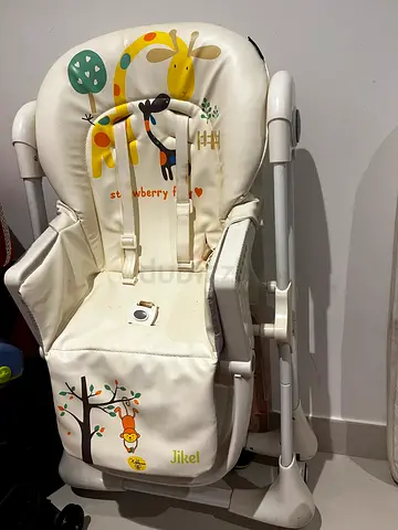 Used baby high chair with padded seat cover - good condition