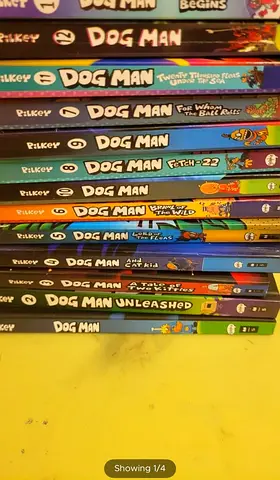 Collection of Dog Man paperback books by Dav Pilkey — multiple volumes