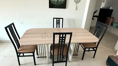 Wooden dining table with 4 chairs — light oak finish