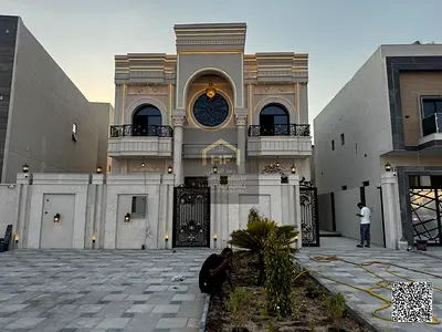 Exquisite Classic 5-Bedroom Master Villa with Rooftop, Outdoor Waterfall & 20m Setback for Sale in Al Helio 1, Ajman – Ready to Move In! A luxury fam