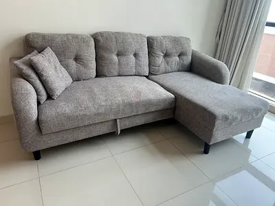 Light grey 3-seater L-shape fabric sofa bed with chaise