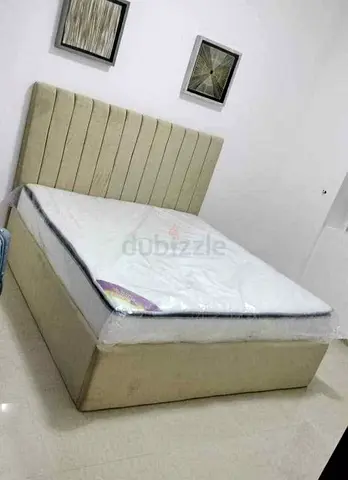 Queen size upholstered bed with medical mattress