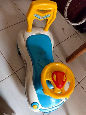 Kids ride-on push car with steering wheel — good used condition