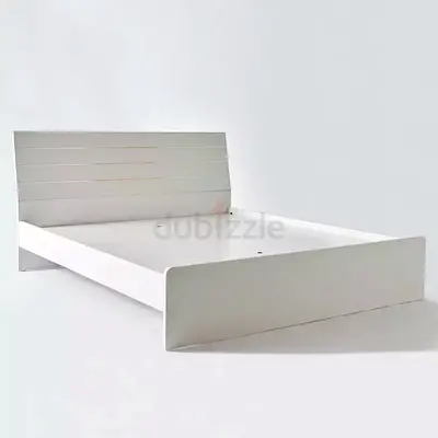 White modern single/double bed frame with slatted headboard