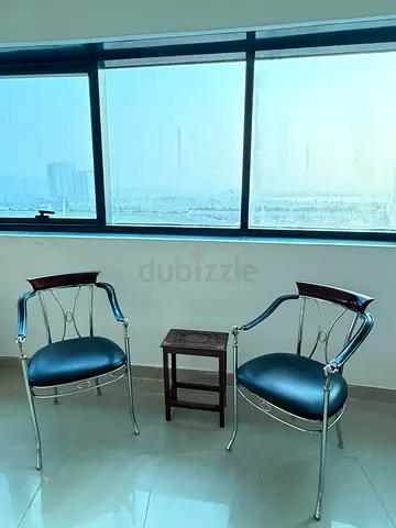 Metal-Frame Accent Chairs + Side Table