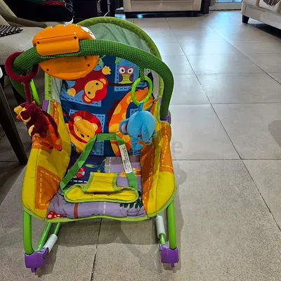 Rocker cum feeding chair and bouncer
