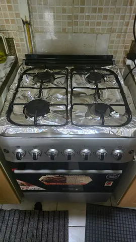 Move out sale - Used 4-Burner Gas Stove with Oven - Stainless Look