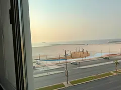 First row on Ajman Corniche, one bedroom and living room, direct and excellent sea view, separate li