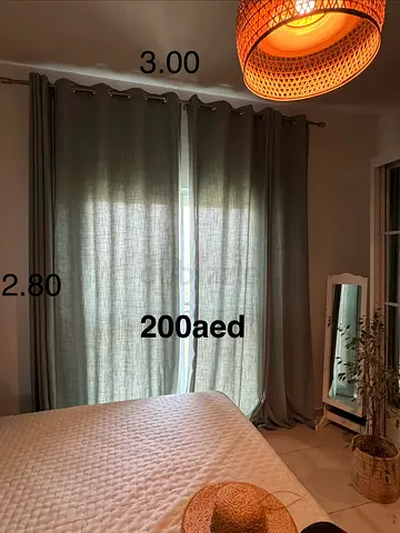 Light green curtains with rail