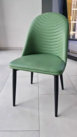 Pair of green modern dining chair with padded seat and black legs