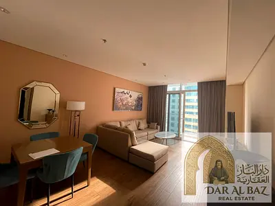 VIP luxury fully furnished 1BHK for lovers of elegance, featuring parking, gym, swimming pool, built-in wardrobes, a large balcony with an open view,