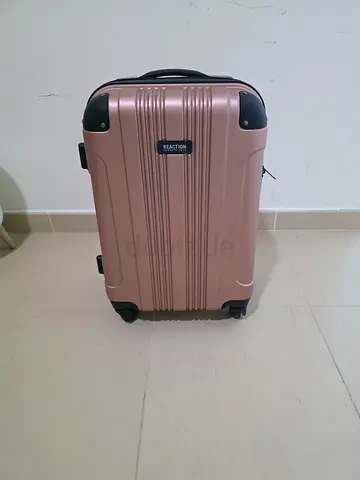 Kenneth Cole Reaction Rose gold hard-shell carry-on suitcase with spinner wheels (small)